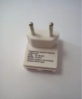 Домашнее универсальное зарядное устройство USB, 2 порта, 5В, выходная сила тока 1А, белый, п/пакет, Netko РАСПРОДАЖА